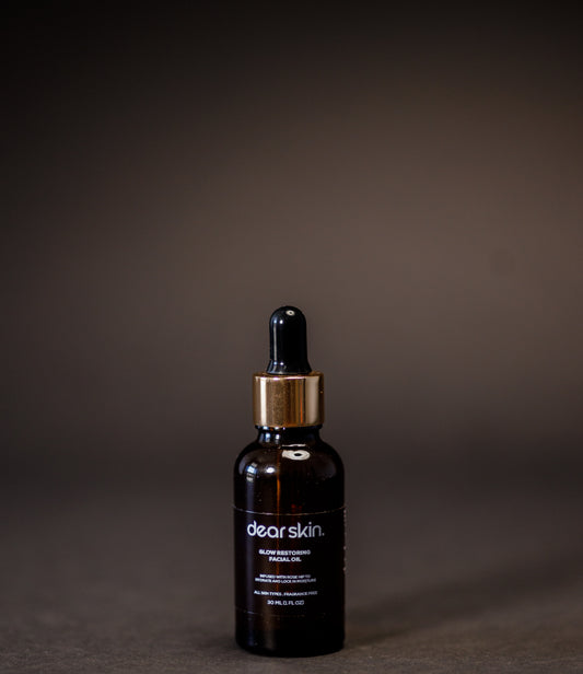 Dear Skin Nourishing Moisturizing Serum in a 30ml amber glass bottle, powered by Vitamin C, aloe vera, and baobab oil for radiant, hydrated skin.