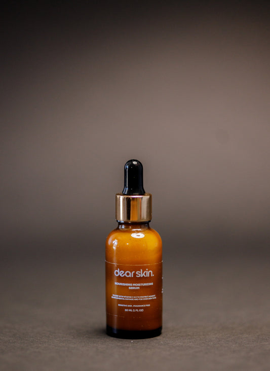 Dear Skin Nourishing Moisturizing Serum in a 30ml amber glass bottle, powered by Vitamin C, aloe vera, and baobab oil for radiant, hydrated skin.