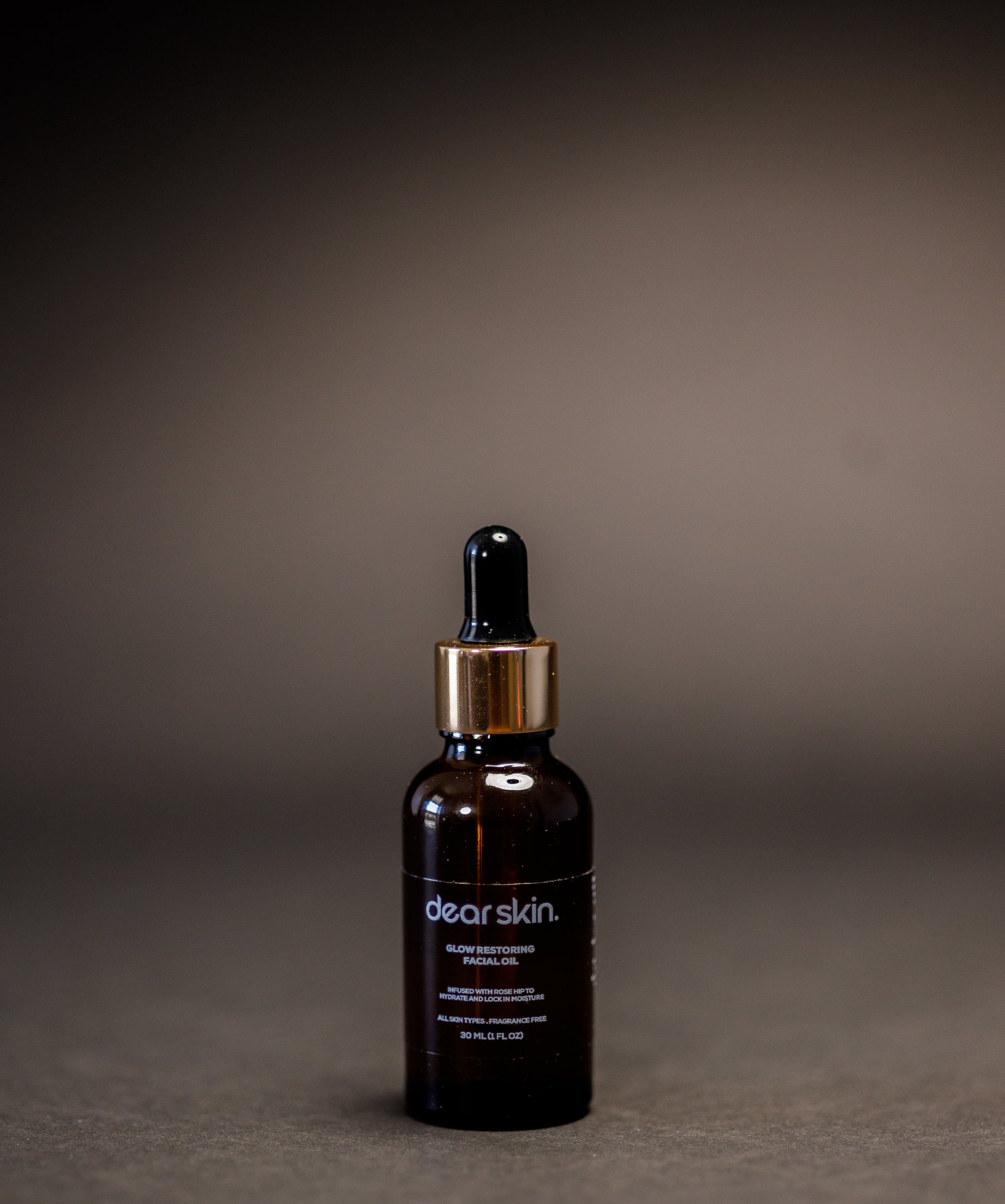 Dear Skin Nourishing Moisturizing Serum in a 30ml amber glass bottle, powered by Vitamin C, aloe vera, and baobab oil for radiant, hydrated skin.