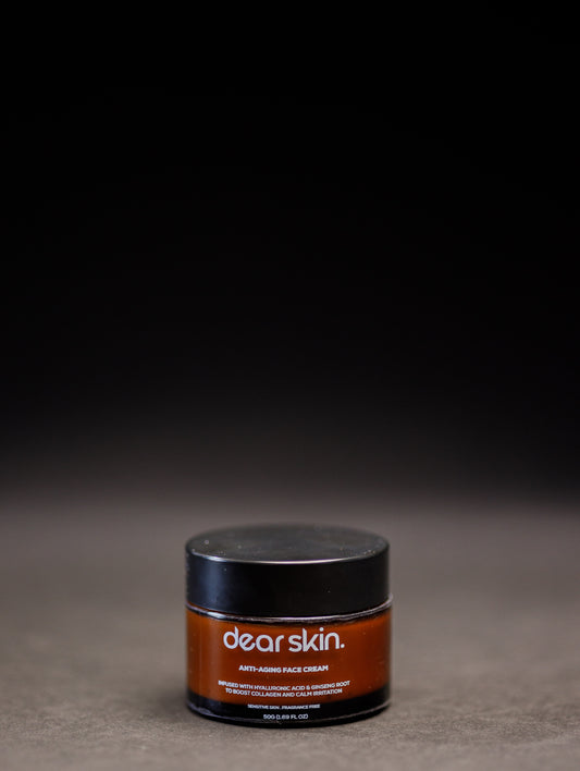 Dear Skin Anti-aging Face Cream in a sleek jar, enriched with ginseng root and hyaluronic acid for firm, radiant skin.